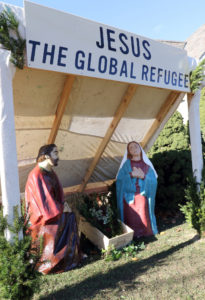 A creche titled "Jesus the Global Refugee" is seen outside Our Lady of the Miraculous Medal Church in Wyandanch, N.Y., Nov. 27. The structure, designed as a refugee's lean-to, was created to call public attention to the biblical mandate to welcome immigrants and give shelter to refugees. (CNS photo/Gregory A. Shemitz) See REFUGEES-IMMIGRANTS-FEARS Nov. 29, 2016.