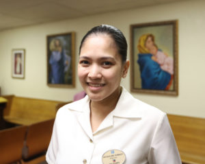 Jacqueline Sumaoy, a waitress on the Norwegian Jewel, said she always stops to pray in 2016 in the chapel at the Stella Maris Chapel and Hospitality Center in Los Angeles. Over the last 12 years of working for the luxury liner, she has spent up to nine months a year away from her home in the Philippines.(CNS photo/Victor Aleman, Angelus News) See SHIPS-CRUISE-LA Jan. 12, 2017.