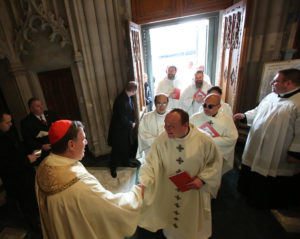 Cardinal Joseph W. Tobin greets clergymen before his Jan. 6 installation Mass at the Cathedral Basilica of the Sacred Heart in Newark, N.J. (CNS photo/Bob Roller) See NEWARK-TOBIN-INSTALLATION Jan, 6, 2017.