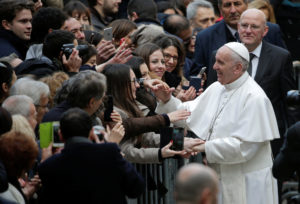Pope Francis greets people as he arrives for a Feb. 17 meeting at Roma Tre University. (CNS photo/Max Rossi, Reuters) See POPE-UNIVERSITY-DIALOGUE Feb. 17, 2017.