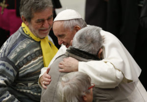 Pope Francis embraces a man while meeting the disabled during his general audience in Paul VI hall at the Vatican Feb. 1. (CNS photo/Paul Haring) See POPE-AUDIENCE-RESURRECTION Feb. 1, 2017.