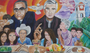 A mural in El Paisnal, El Salvador, seen in this Jan. 29 photo, features Blessed Oscar Romero and town native Father Rutilio Grande, surrounded by rural men, women and children, the community the Jesuit Father Grande served from 1972 until his March 12, 1977, assassination. Father Grande spoke of his dream of a communal table where everyone, including the poor, had a place to eat and a right to have a say in matters that affected them. (CNS photo/Rhina Guidos) See GRANDE-SAINT-JESUIT March 8, 2017.