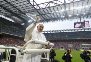 Pope Francis greets the crowd during an encounter with confirmation candidates at San Siro Stadium in Milan March 25. (CNS photo/Stefano Rellandini, Reuters) See POPE-MILAN-MASS-YOUTH March 25, 2017.