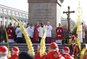 Pope Francis begins the celebration of Palm Sunday Mass at the obelisk in St. Peter's Square at the Vatican April 9. (CNS photo/Paul Haring) See POPE-PALM-SUNDAY April 9, 2017.