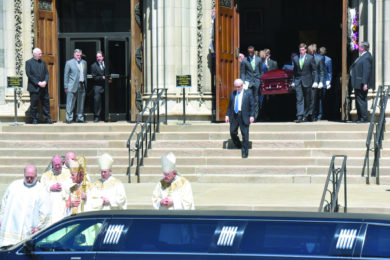 Pallbearers carry the casket of Daniel Rooney, chairman of the Pittsburgh Steelers, after his funeral Mass at St. Paul Cathedral in Pittsburgh April 17. (CNS photo/Chuck Austin, Pittsburgh Catholic) See ROONEY-FUNERAL April 20, 2017.