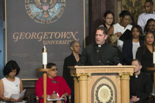 Jesuit Father Timothy Kesicki, president of the Jesuit Conference of Canada and the United States, delivers the homily at an April 18 "Liturgy of Remembrance, Contrition and Hope" in Gaston Hall on the campus of Georgetown University in Washington. (CNS photo/Jaclyn Lippelmann, Catholic Standard) See GEORGETOWN-BUILDINGS-SLAVES April 19, 2017.
