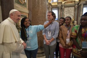 Pope Francis poses for a selfie during an evening prayer vigil with young people at the Basilica of St. Mary Major in Rome April 8. (CNS photo/L'Osservatore Romano) See POPE-YOUTH-VIGIL April 10, 2017.