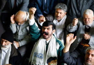 Iranian men shout anti-U.S. slogans after Friday prayers  in Tehran, Iran, April 7, following U.S. missile strikes in Syria. (CNS photo/Abedin Taherkenareh, EPA)