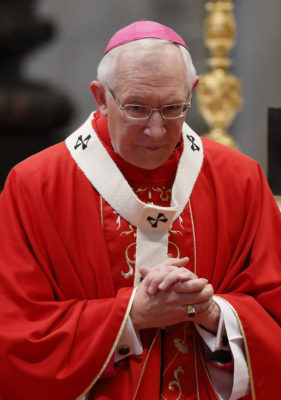 Archbishop Leonard P. Blair of Hartford, Conn., walks to his seat after receiving a pallium from Pope Francis during a Mass marking the feast of Sts. Peter and Paul in St. Peter's Basilica at the Vatican June 29. Archbishop Blair was among 24 archbishops from around the world to receive the pallium, a woolen band worn around the shoulders that symbolizes an archbishop's authority as shepherd and his communion with the pope. (CNS photo/Paul Haring) (June 30, 2014) See POPE-PALLIUM June 30, 2014.