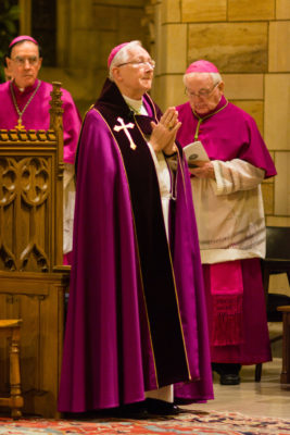 Archbishop Leonard P. Blair prays during the vespers service at St. Thomas Seminary in Bloomfield, Conn., Dec. 15, the eve of his installation as the fifth archbishop of the Archdiocese of Hartford. His installation Mass was celebrated the following day at the Cathedral of St. Joseph in Hartford. He succeeds Archbishop Henry J. Mansell, 76, who retired. (CNS photo/Bob Mullen) (Dec. 19, 2013) See BLAIR-INSTALL Dec. 19, 2013.