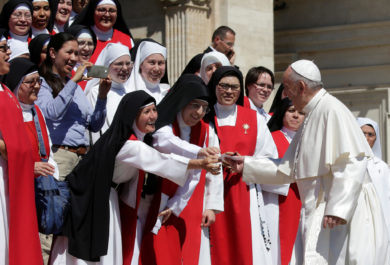 Pope Francis greets a group of nuns as he arrives for his general audience in St. Peter's Square May 17 at the Vatican. (CNS photo/Max Rossi, Reuters) See POPE-AUDIENCE-MAGDALENE May 17, 2017.