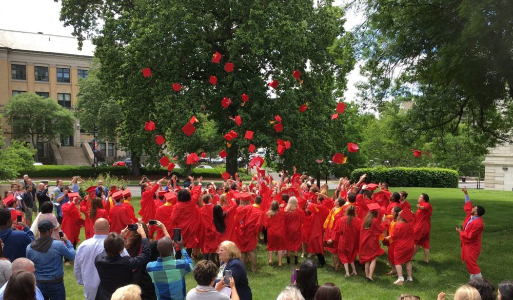 The first Pope Francis High School graduates gather on the front lawn ...