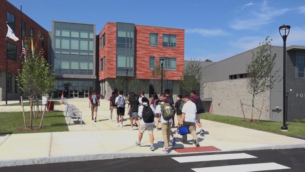 Students arrive for class at the new Pope Francis Preparatory School ...
