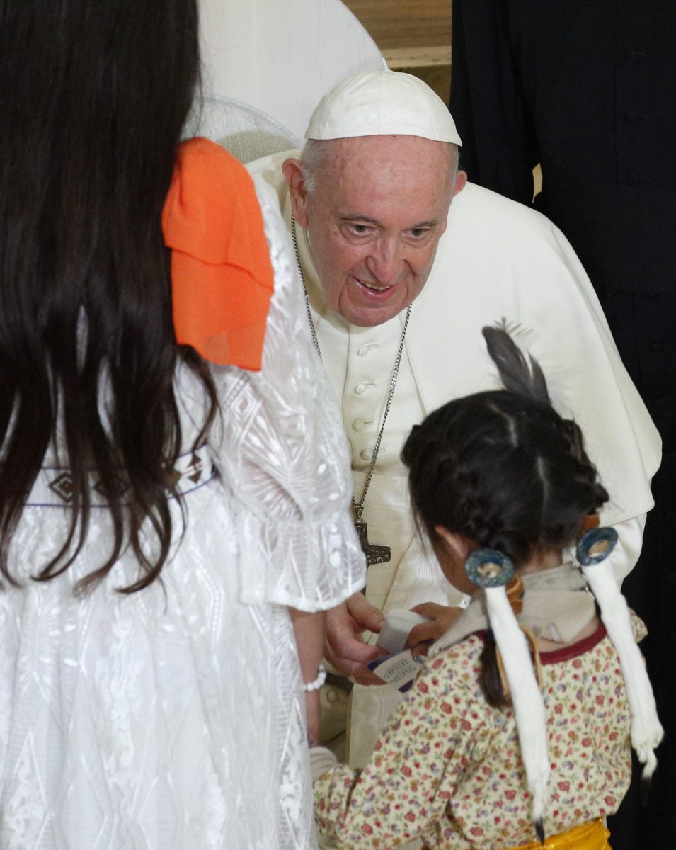 Pope Francis greets family members during a meeting with Indigenous ...