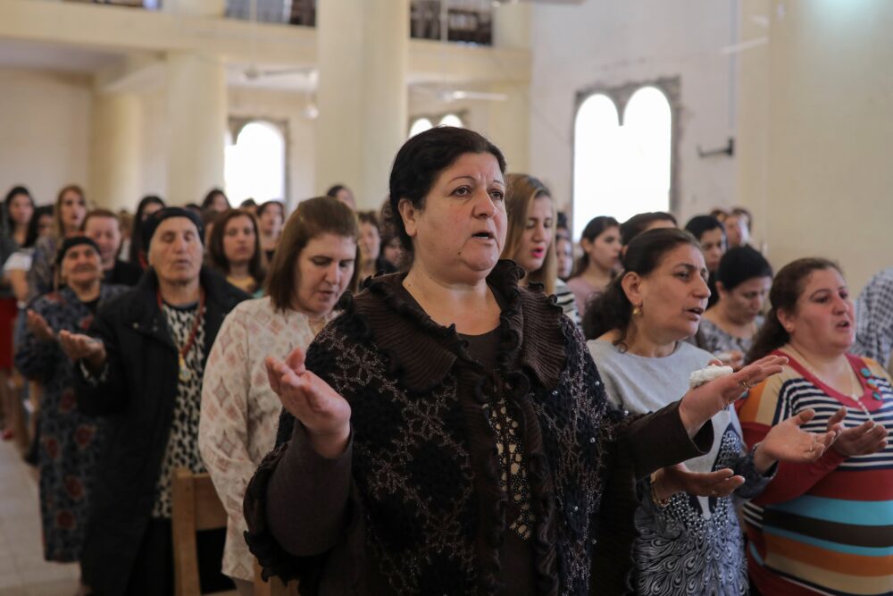 Iraq Church Worshippers are pictured in a file photo praying during Mass at St ...