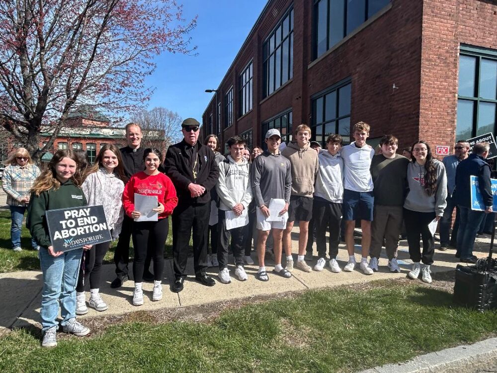 Students from Pope Francis Preparatory School pose for a picture with ...