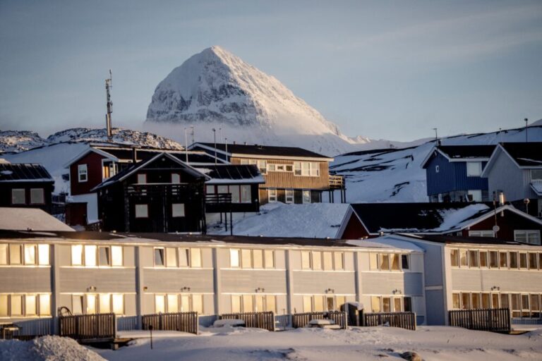 Homes are seen near a mountain peak in Nuuk, Greenland, Jan. 20, 2026 ...