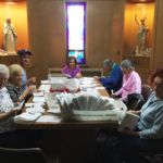The Mailing Team at Our Lady of Mt. Carmel Parish in Springfield prepares 650 Mt. Carmel Parish Summer Newsletters for the post office bulk mail.