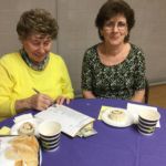 Women's Guild members at Our Lady of Mt. Carmel Parish in Springfield prepare a shopping list for their June supper supply for the Open Pantry in Springfield. Forty-two members donated funds to purchase, prepare and serve the meal to Springfield's needy individuals and families.