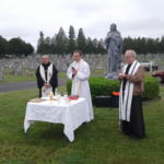 Conventual Franciscan Father Albert Scherer (right), along with Fathers Andrzej Brzezinski and Stanley Sobiech, concelebrates the Memorial Day Mass at Mater Dolorosa Cemetery in South Hadley.