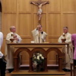 Msgr. Christopher Connelly (center) celebrates daily Mass at the Holy Spirit Chapel at St. Michael's Cathedral along with Fathers Christopher Malatesta (left) and John Sheaffer. All three priests are celebrating the 25th anniversary of their ordinations this year.