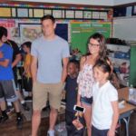 Students from the St. Joan of Arc School Class of 2015 visit their "kinder buddies," who are now in third grade.
