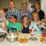 Youths from Holy Trinity Parish in Westfield serve ice cream at the parish's popular Friday Night Ice Cream Social.