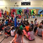 Youngsters join the "Winner's Circle" during Vacation Bible Camp at St. Michael Parish in East Longmeadow.