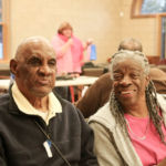 Diners enjoy the festivities at the Harvest Supper at St. Michael's Cathedral Parish in Springfield.