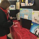 During a recent pasta supper at Our Lady of Mt. Carmel Parish in Springfield, parishioners voted on the 16 youth poster entries for the Knights of Columbus "Keep Christ in Christmas Poster Contest." The parish's K of C Council will submit selections to the national contest.