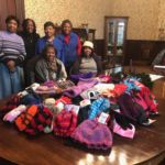 The Ladies of St. Peter Claver Court 290 at St. Michael's Cathedral in Springfield recently sponsored a Hat and Mitten Drive to provide warmth for the children of the Springfield area. Donations came from parishioners and from as far away as Florida, Tennessee and Boston.