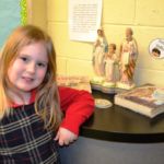 St. Michael's Academy first-grader Giavonna Mulrooney will be featured in the cover story of the April issue of The Catholic Mirror, set to arrive in homes the week of April 15.