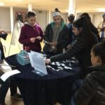 Sunday morning Mass-goers at Our Lady of Mt. Carmel Parish in Springfield visit Stations of the Cross meditation displays set up by religious education students.