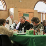 Springfield Bishop Mitchell Rozanski visits with other guests at the Annual Irish Night held at St. Michael's Cathedral in Springfield.