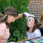 Children enjoyed face painting, a bounce house and water balloon games at St. Mary's Fall Festival in Westfield. Food was provided by North Elm Butcher Block and the Hispanic Community.