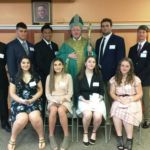Confirmation students pose with Springfield Bishop Mitchell Rozanski at Our Lady of Mt. Carmel Parish, Springfield.
