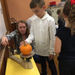 At St. Joan of Arc School in Chicopee, students in grades one through four participate in a "pumpkin investigation."