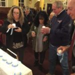 The annual November Memorial Mass at Our Lady of Mt. Carmel Parish in Springfield honored 67 people who have died during the last year. Family members of the deceased took part in a candle ritual.