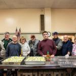 Volunteers from St. Michael's Cathedral Parish in Springfield serve at the soup kitchen at South Congregational Church.