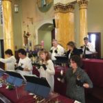 The Mt. Carmel Bell Choir performed during the annual Christmas Carol Festival at Our Lady of Mt. Carmel Parish in Springfield.