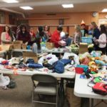 At Our Lady of Mt. Carmel Parish in Springfield, families filled more than 100 shoe boxes of gifts for children. Seventy-one boxes were shipped overseas and 45 went to local client families of the Catholic Charities Agency.