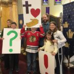 At the Our Lady of Mt. Carmel Christmas Carol Festival, parishioners illustrate the theme "What Do You Want for Christmas?"